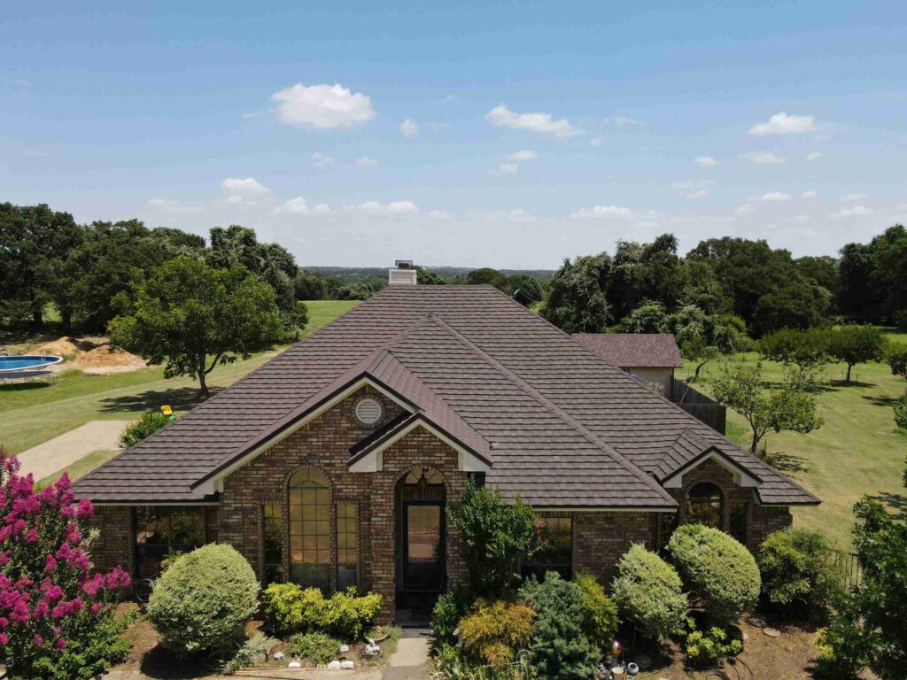 New shingle roof by One Oak Exteriors